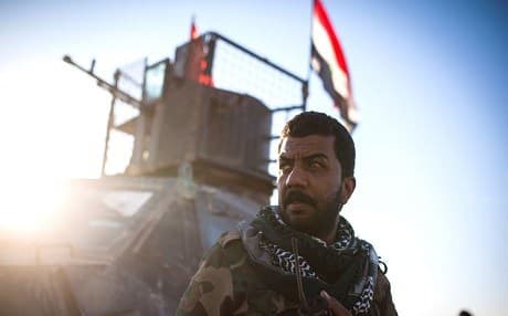 A member of the Iranian-backed Hashd al-Shaabi militia in Iraq Photo: AFP/ ACHILLEAS ZAVALLIS/ Getty Images