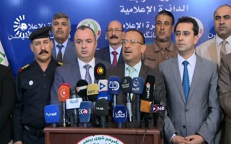Nineveh's provincial council speak to reporters after prison visits on July 7