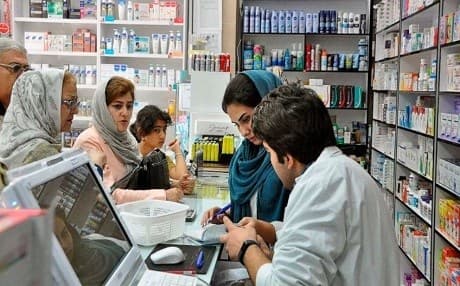 Iranian pharmacists work at a pharmacy counter in central Tehran, Iran, December 11, 2012. File photo: Vahid Salemi | AP