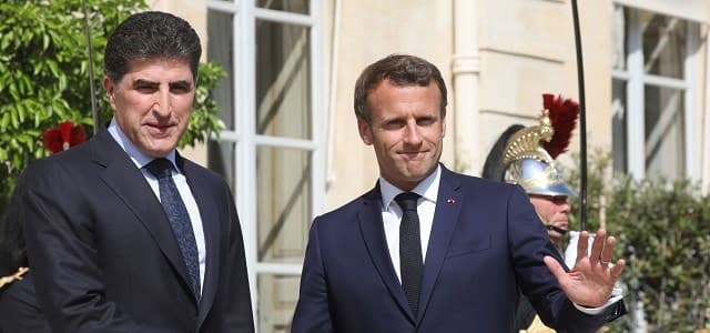 French President Emmanuel Macron (C) shakes hands with President of the Kurdistan Regional Government of Iraqi Kurdistan Netchirvan Barzani ahead of their meeting at the Elysee palace in Paris, July 10, 2019. Photo: ludovic Marin / AFP