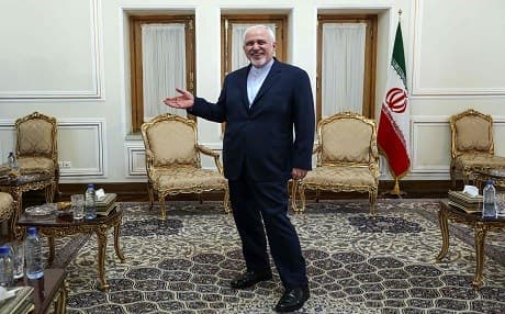 Iranian Foreign Minister Mohammad Javad Zarif gestures as he stands in an office as he meets with the diplomatic advisor to the French president in the capital Tehran on July 10, 2019.  Photo: Atta Kenara | AFP