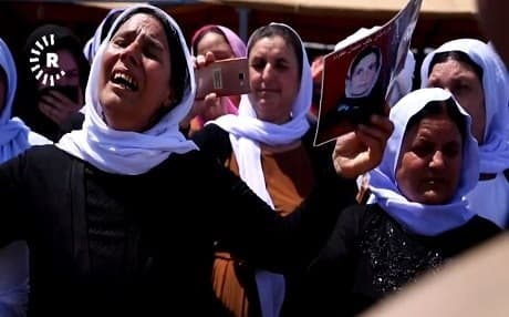 A Yezidi woman in Chamishko camp crying on the fifth anniversary of the Yezidi genocide. Photo Rudaw TV