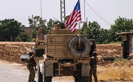 US soldiers climb into a vehicle as they prepare to leave the city of Ras al-Ain in Syria’s Hasaka province, July 28, 2019. File photo: AFP