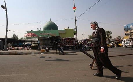 A Kurdish man walks through the streets of Kirkuk, September 18, 2017. File photo: AFP  