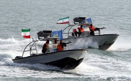 Iranian Revolutionary Guards drive speedboats at the port of Bandar Abbas, July 2, 2012. File photo: Atta Kenare / AFP 