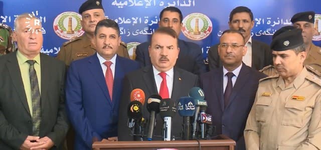 Iraqi Minister of the Interior Yassin al-Yasseri (center) next to Nineveh Provincial Council President Saido Chato (right) at a press conference in Mosul on August 11. Photo: Rudaw TV 