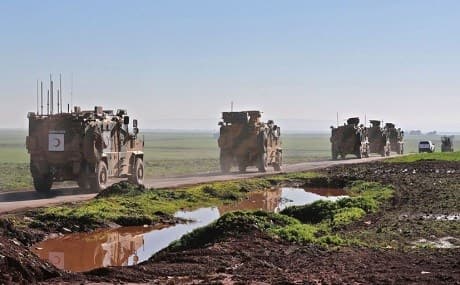 Turkish military vehicles drive through Syria’s Aleppo province, March 8, 2019. File photo: Omar Haj Kadour / AFP