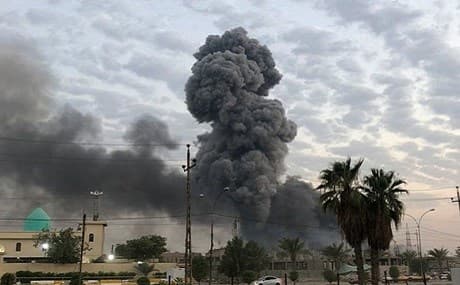Plumes of smoke rise after an explosion at a military base southwest of Baghdad, Iraq, Augusy 12, 2019. Photo: Loay Hameed / AP