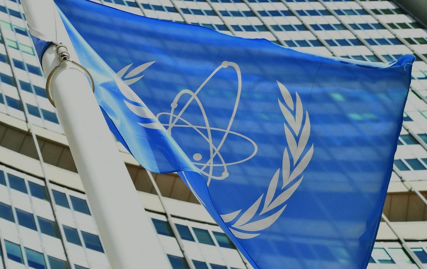 IAEA flag flies outside the agency's headquarters in Vienna, Austria. File photo: Dean Calma / IAEA