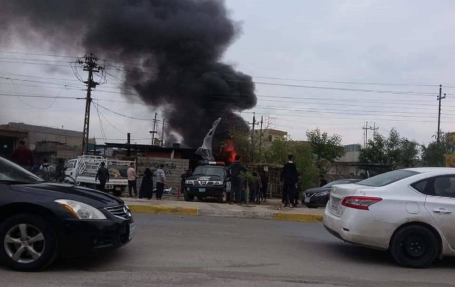 A police vehicle was destroyed and an officer killed by a roadside blast in Panja Ali, Kirkuk. Photo via social media