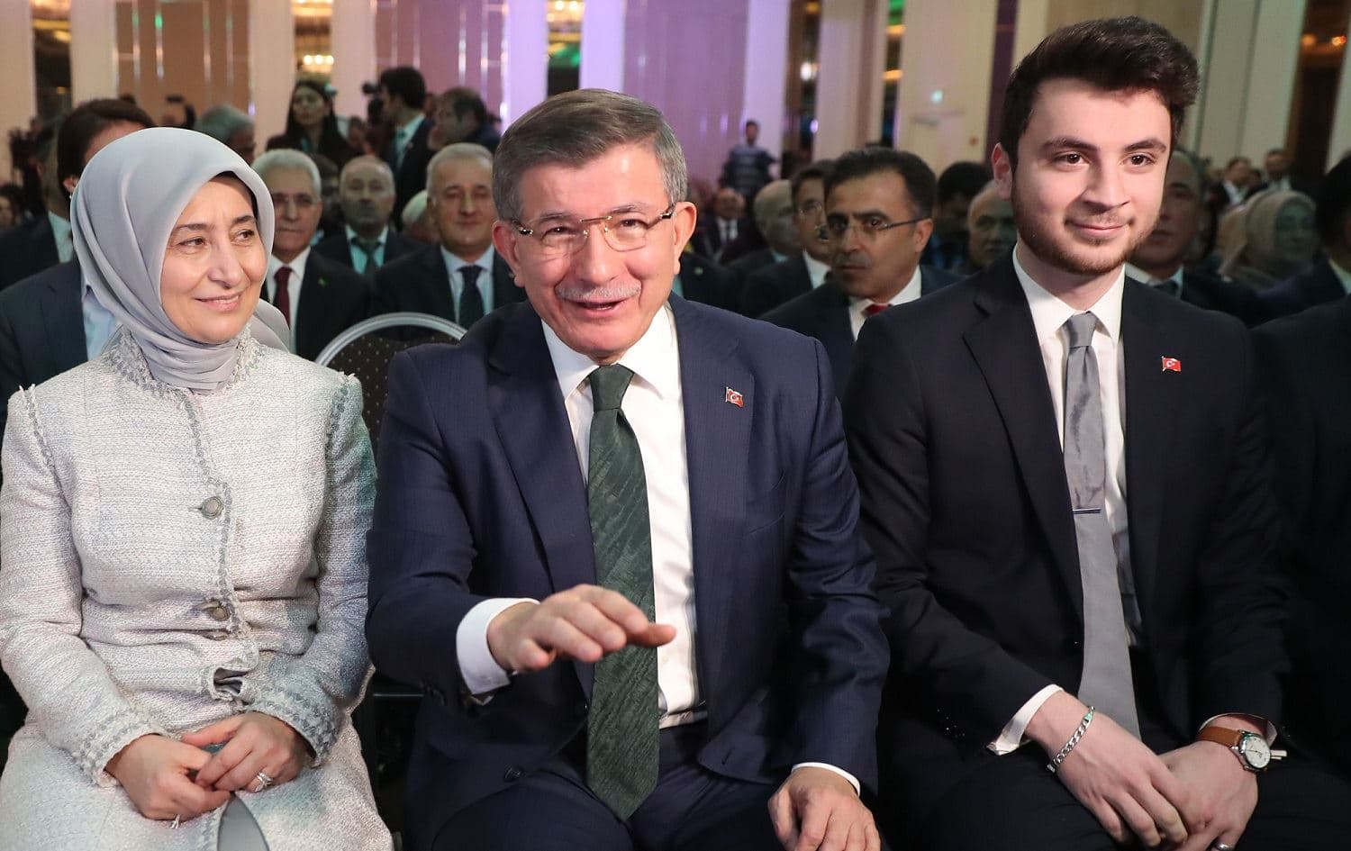 Former Turkish prime minster Ahmet Davutoglu (C), accompanied by his wife Sare Davutoglu (L), takes part in a press conference to announce the establishment of his future political party in Ankara, December 13, 2019. Photo: Adem Altan / AFP