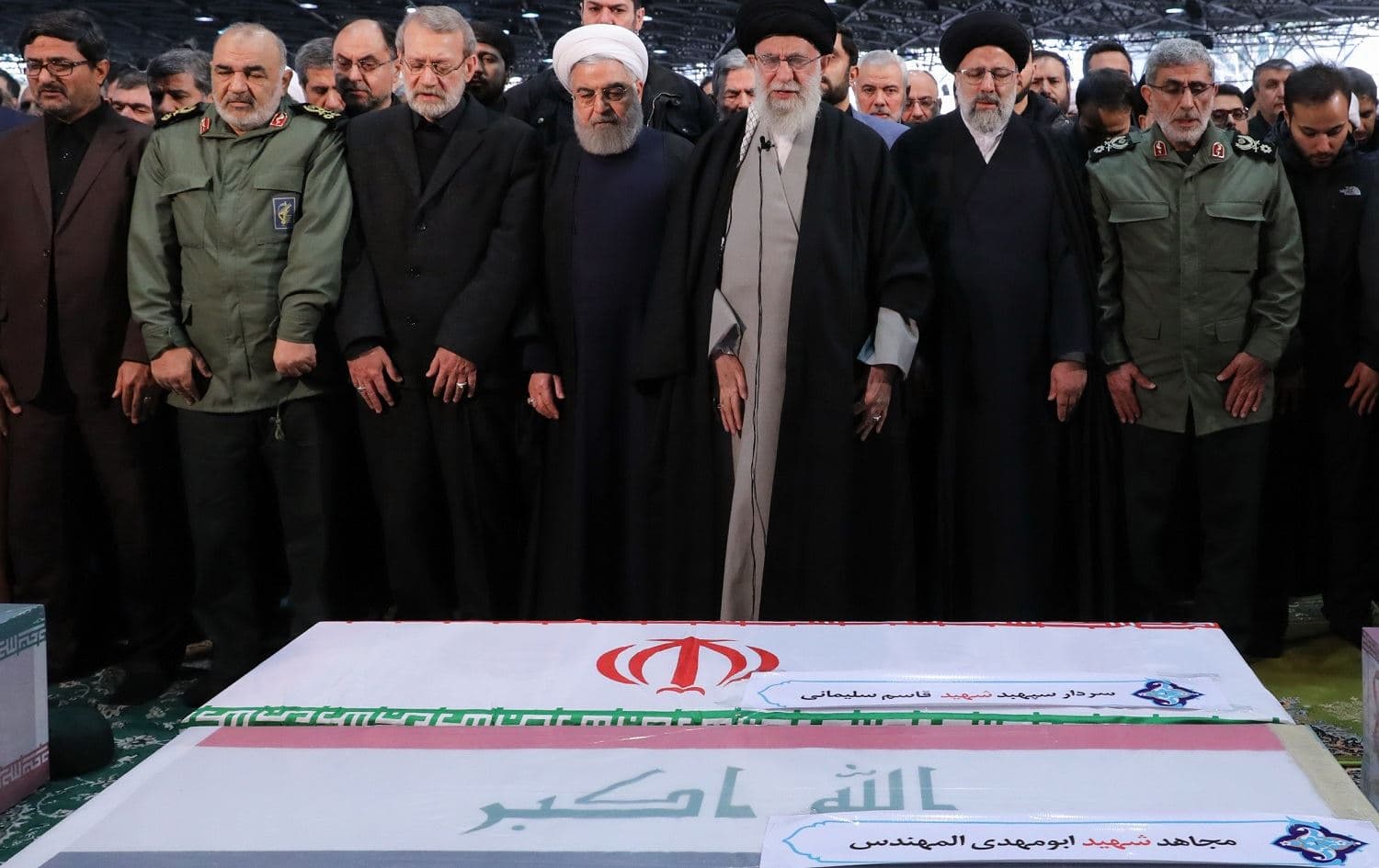 Supreme Leader Ali Khamenei, flanked by officials including President Hassan Rouhani, IRGC chief Hossein Salami and newly-appointed Quds Force head Esmail Qaani, pray over the bodies of General Soleimani and PMF commander Abu Mahdi al-Mohandis at Tehran University on January 6, 2020. Photo: Khamenei.ir