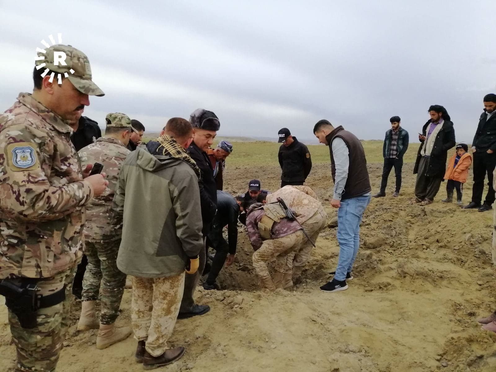 Kurdish security forces inspect the remnants if a missile that struck 2 kilometers from the town of Bardarash, Duhok province, on January 8, 2020. Photo: Rudaw