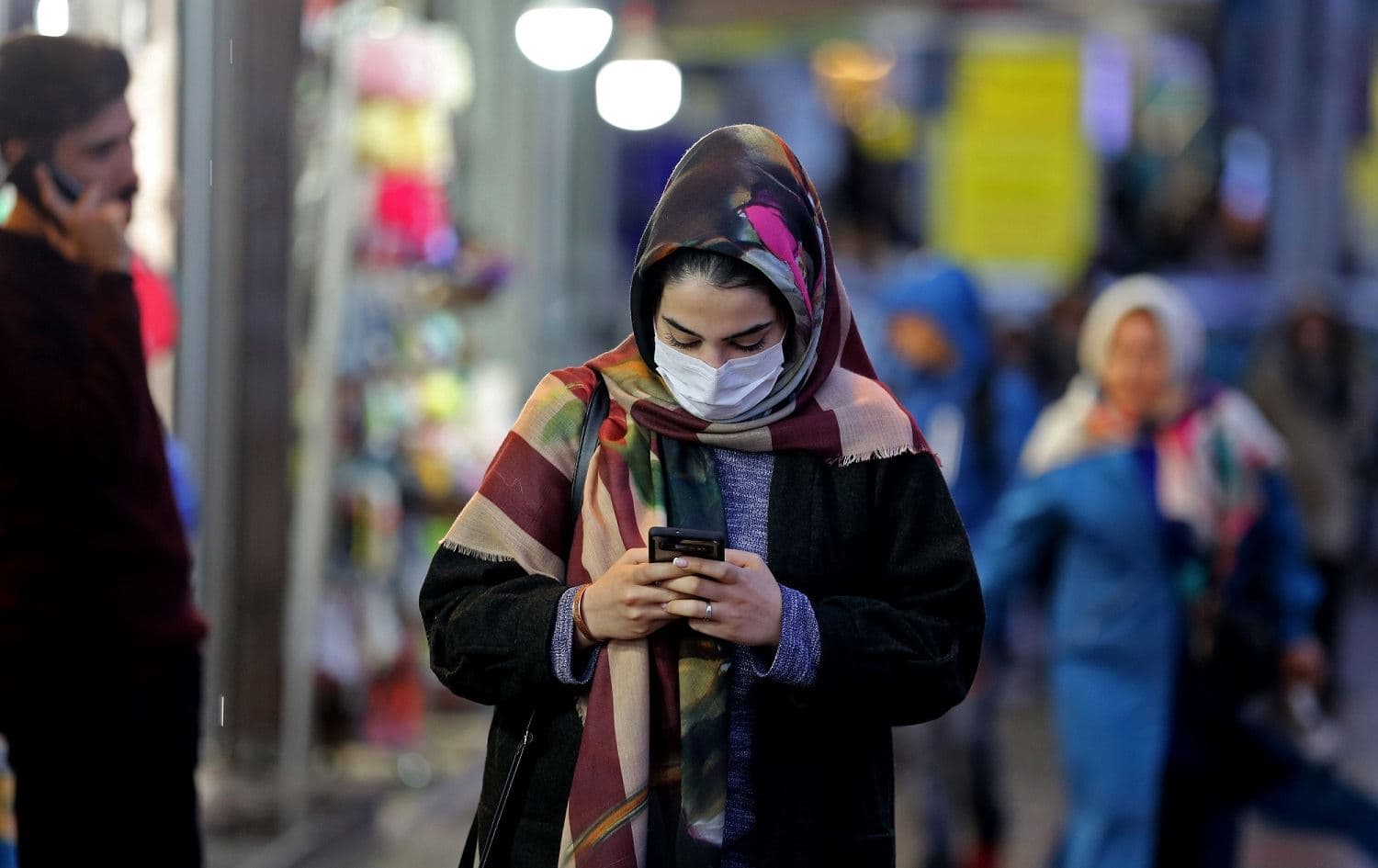 An Iranian woman wears a protective mask in the capital Tehran, February 20, 2020. Photo: Atta Kenare / AFP