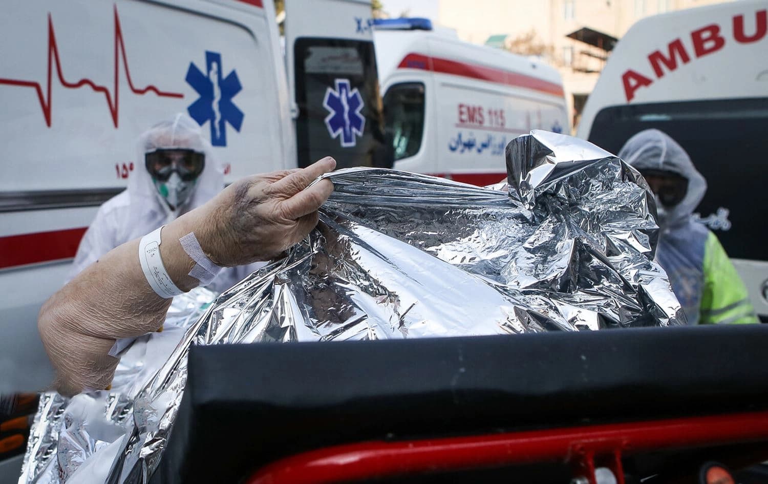 An Iranian woman arrives at a hospital in Tehran, Iran, suspected of contracting coronavirus. Photo: Asghar Khamseh / IRNA