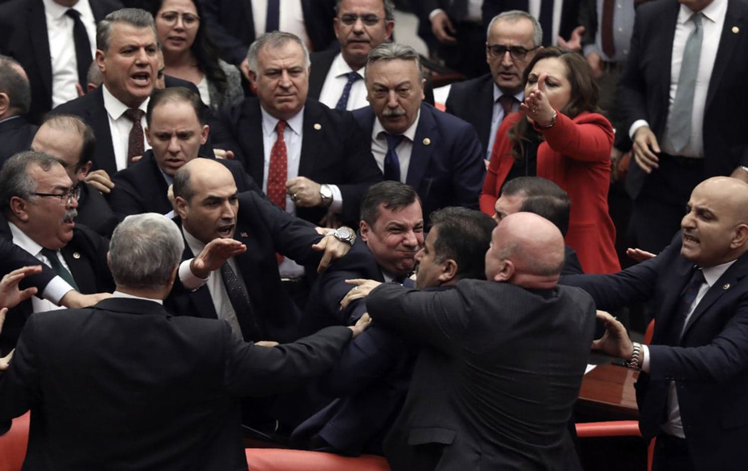 Legislators push each other as a brawl breaks out in Turkey's parliament in Ankara, Turkey, March 4, 2020. Photo: AP 