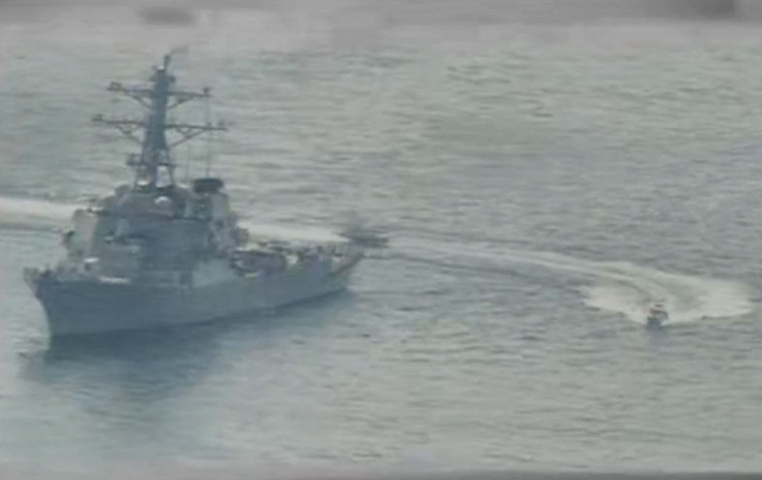 Iranian Islamic Revolutionary Guard Corps Navy (IRGCN) vessels purportedly approach US military ships while operating in international waters of the Persian Gulf on April 15, 2020. File photo: Navy Office of Information / AFP