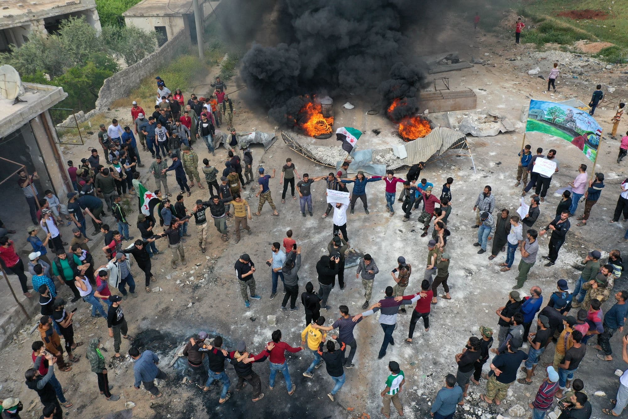 A protest in the village of Maaret al-Naasan in Syria's Idlib province on May 1, 2020, to protests against a reported attack by Hayat Tahrir al-Sham a day earlier. Photo: Omar Haj Kadour/AFP
