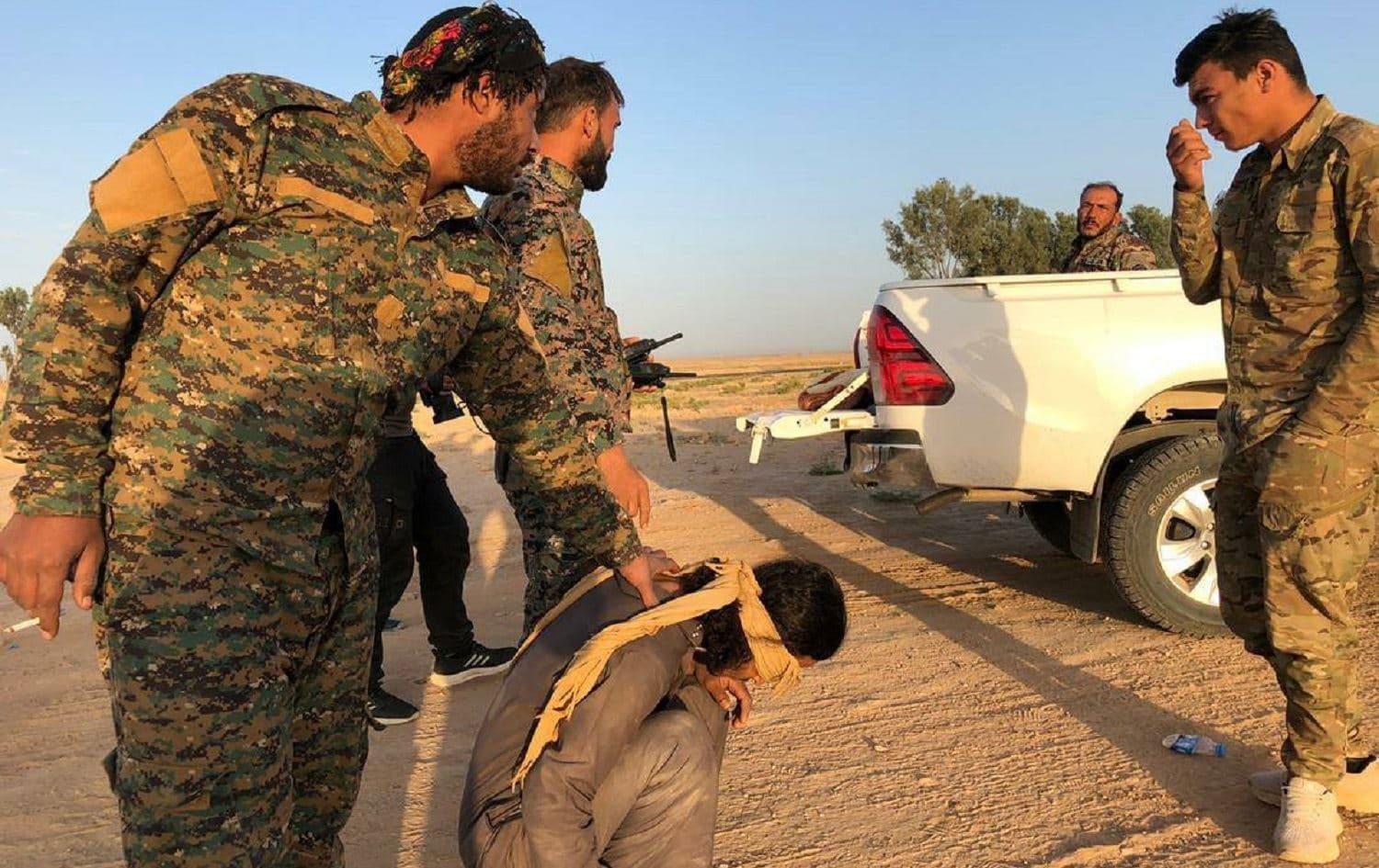 An ISIS suspect is arrested as part of the SDF's Deterrence of Terrorism operation. Photo: ANHA