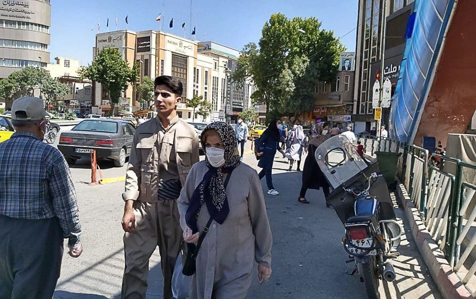 Pedestrians wearing facemasks on a street in Sanandaj city, Iran on June 12. 2020. Photo: Jabar Dastbaz / Rudaw English