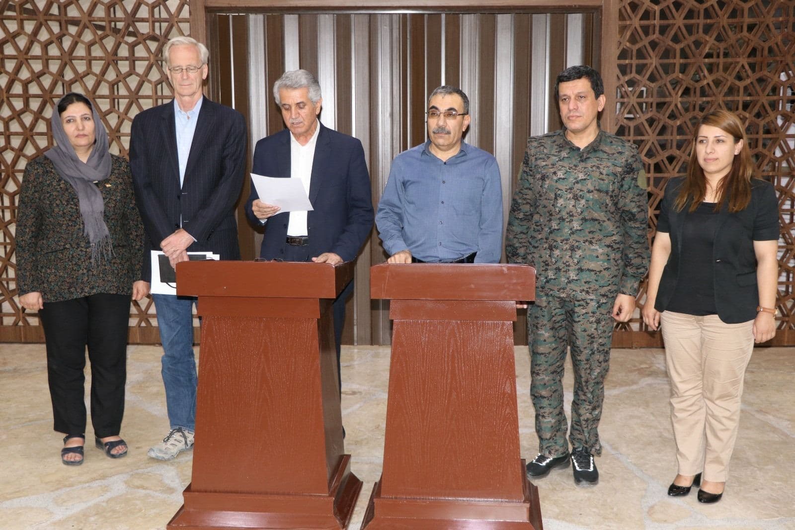 Kurdish and US officials announcing the initial unity deal of Unity talks. Photo: ANHA