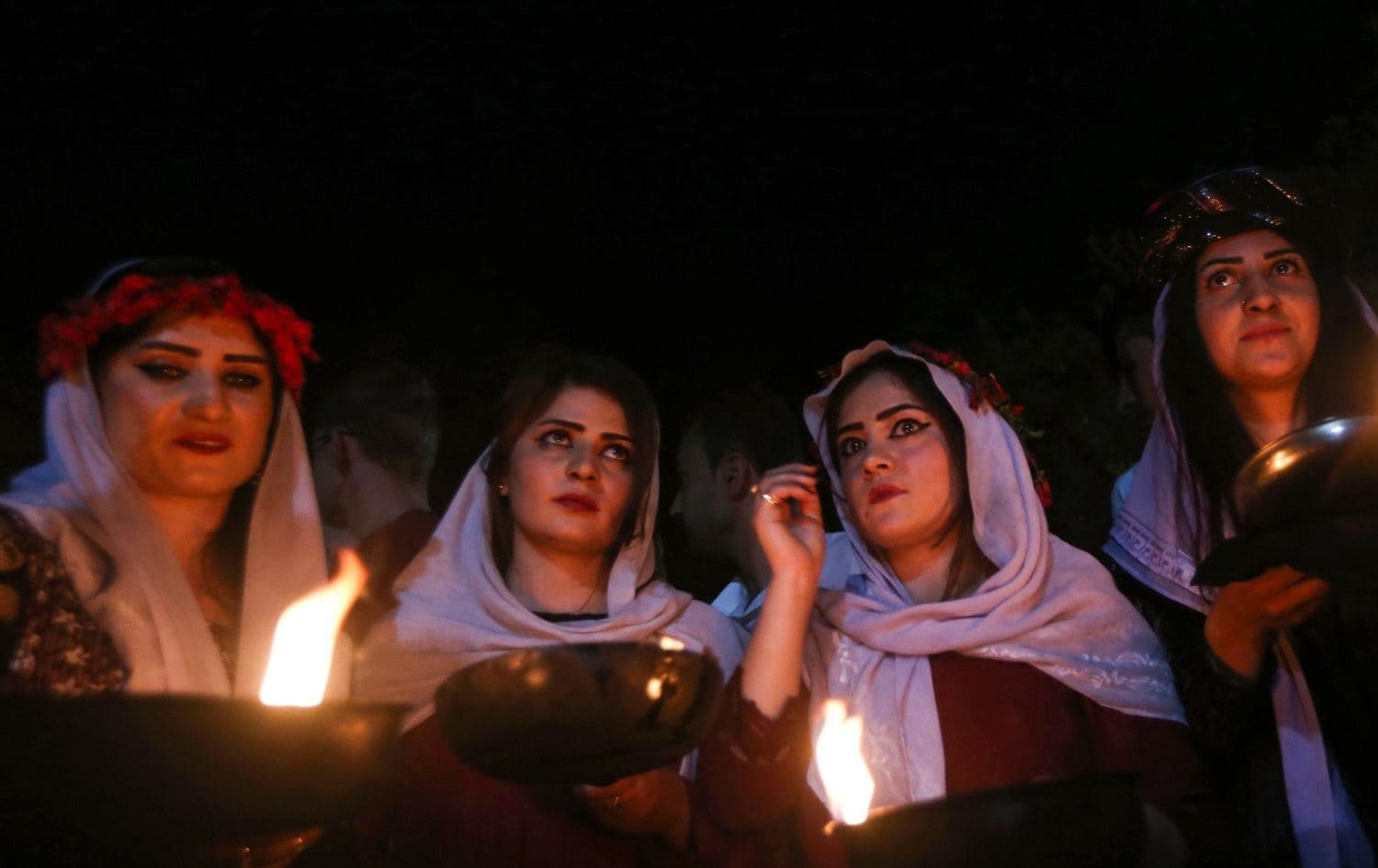 Yezidi women celebrate the new year at Lalish temple on April 18, 2017. Photo: Safin Hamed / AFP