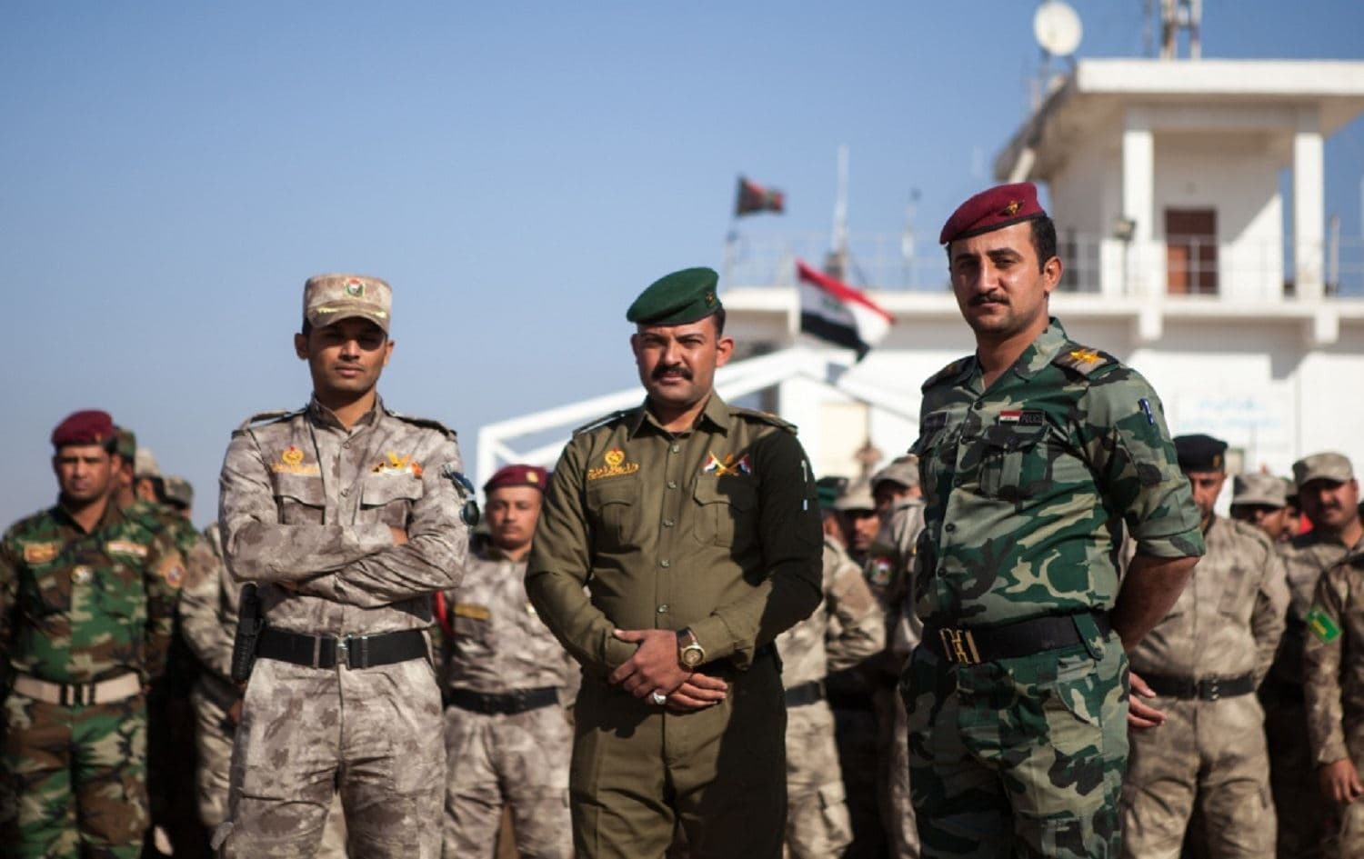 Members of the Iraqi border guard police wait at a graduation ceremony at the Besmaya Range Complex, Iraq on Nov 29, 2016. Photo: Sgt.Josephine Carlson/US Army