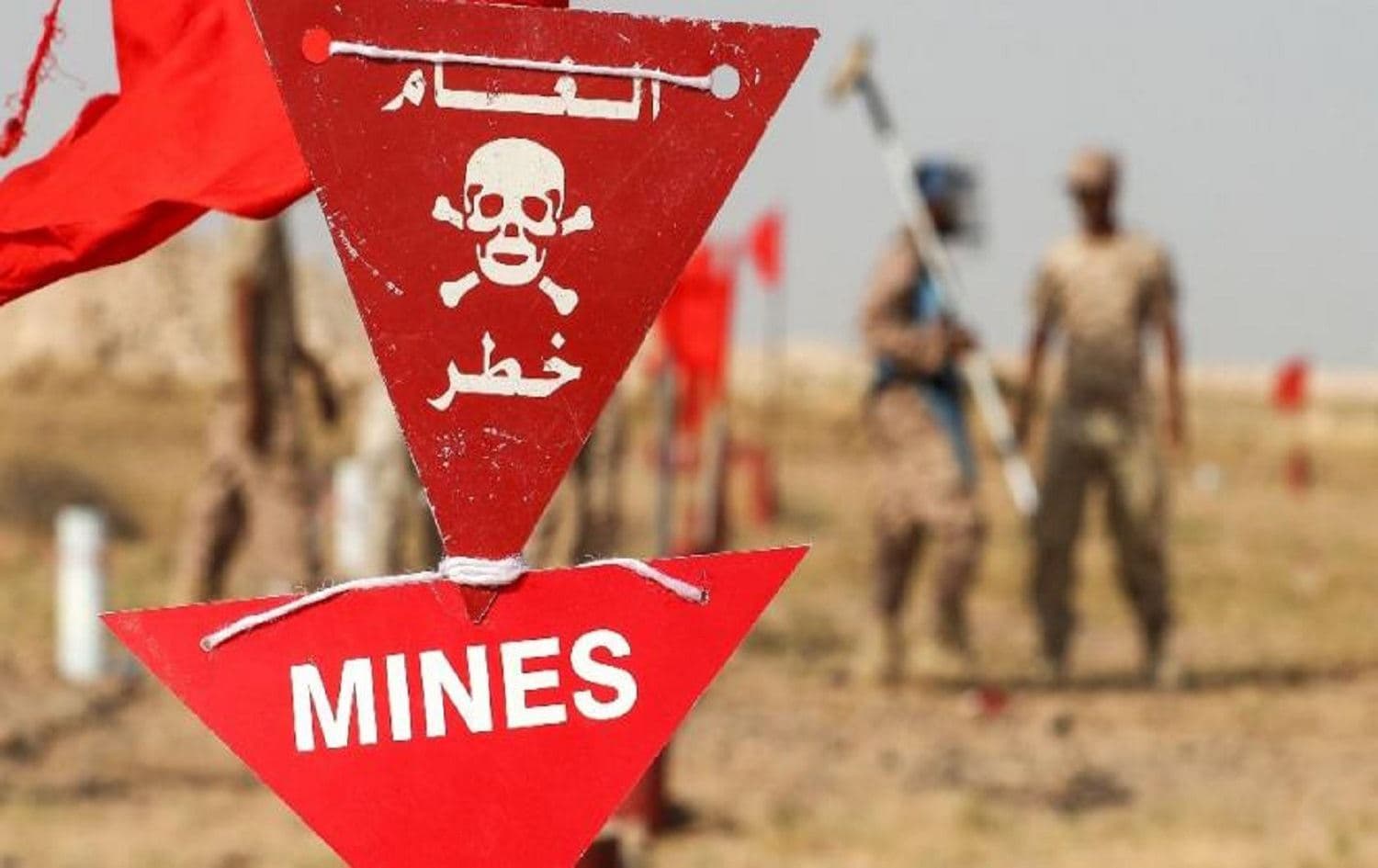A mine warning sign. Photo: Karim Sahib / AFP