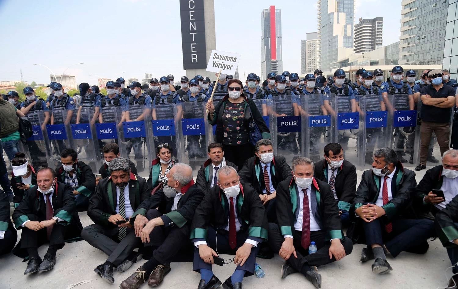 Chairs of Turkey’s provincial bar associations stage a sit-in demonstration after police blocked the group from marching to Ankara on June 22, 2020. Photo: AP