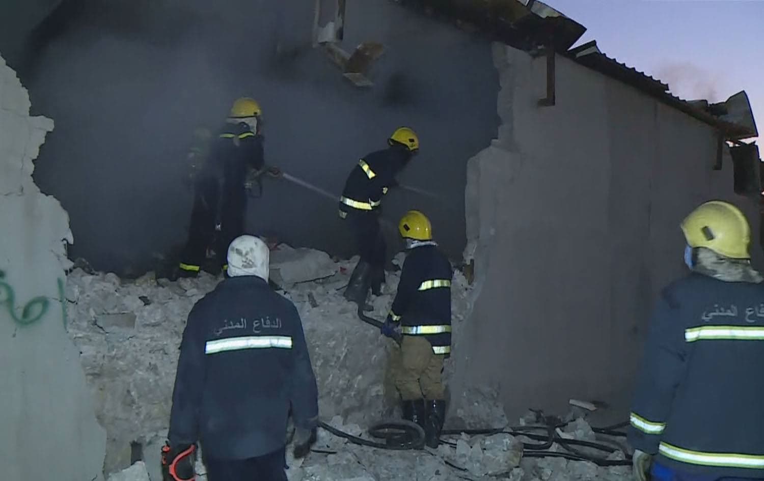 Firefighters tackle a blaze at a medical warehouse in Kirkuk on Friday. Photo: Rudaw