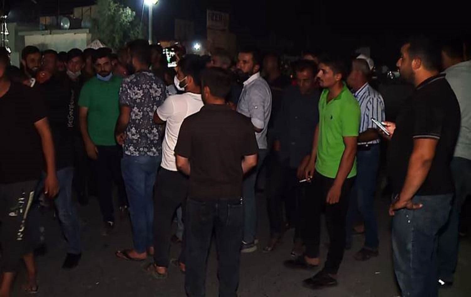 Truckers gathered in Zakho Wednesday to protest a Kurdistan Regional Government (KRG) decision to re-allow the operation of Turkish truckers in the Region. Photo: Rudaw