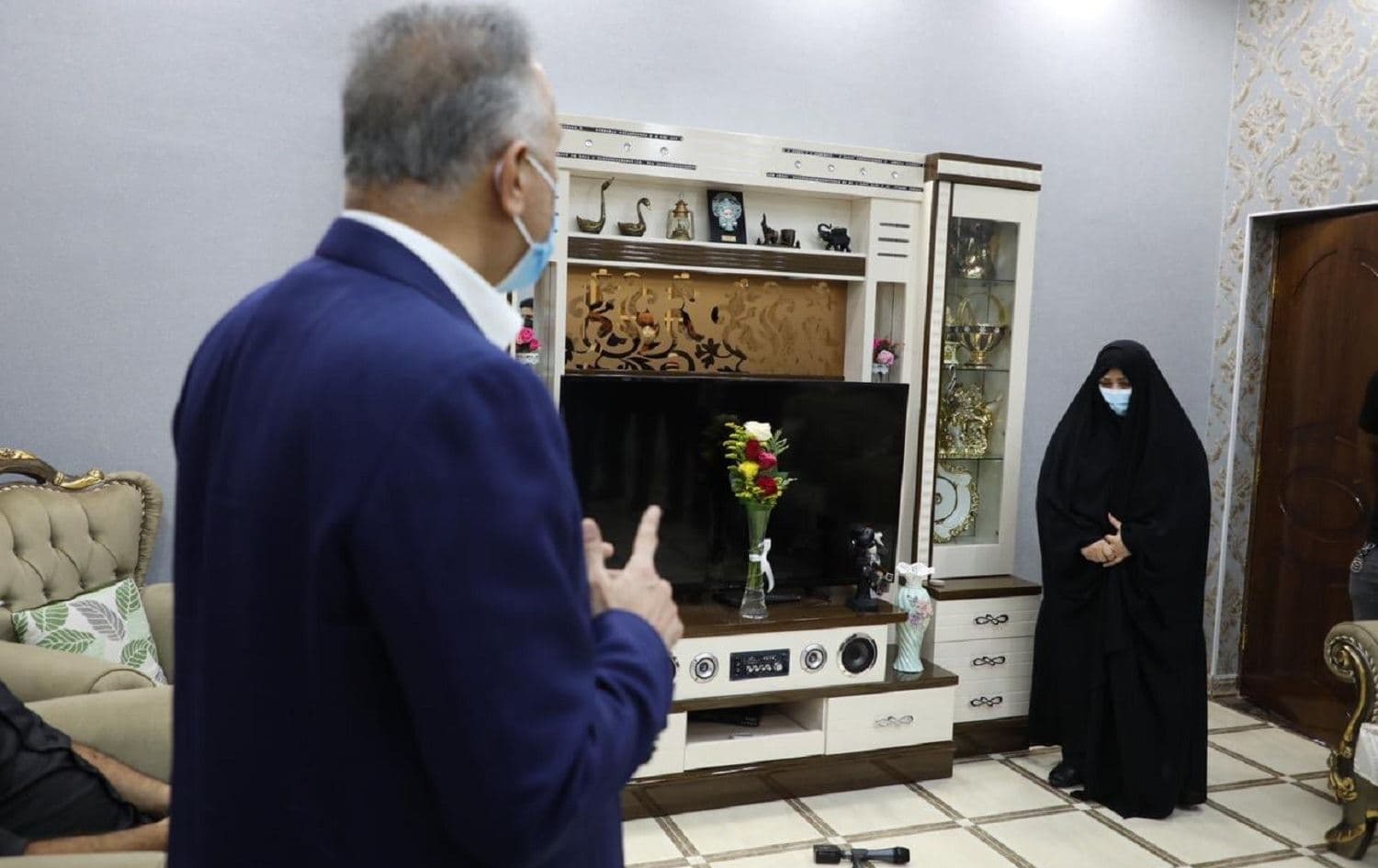  Iraqi prime minister Mustafa al-Kadhimi meets the mother of killed activist Reham Yacoub on August 22, 2020. Photo: Iraq PMO on Twitter
