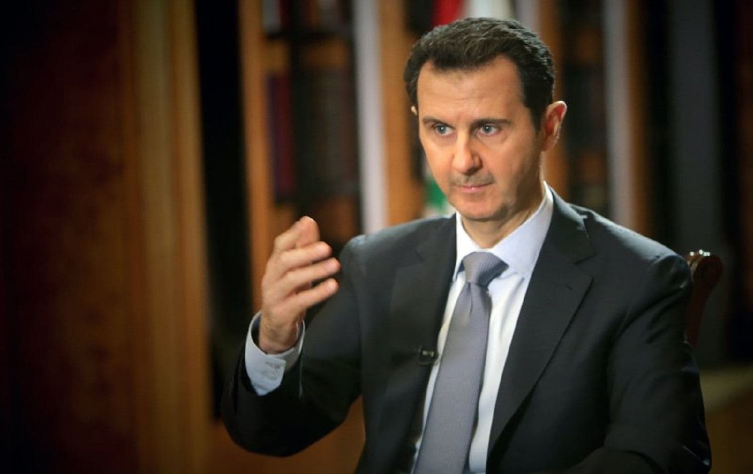 Syrian President Bashar al-Assad speaks during an interview with AFP at the presidential palace in Damascus on January 20, 2014. Photo: Joseph Eid / AFP