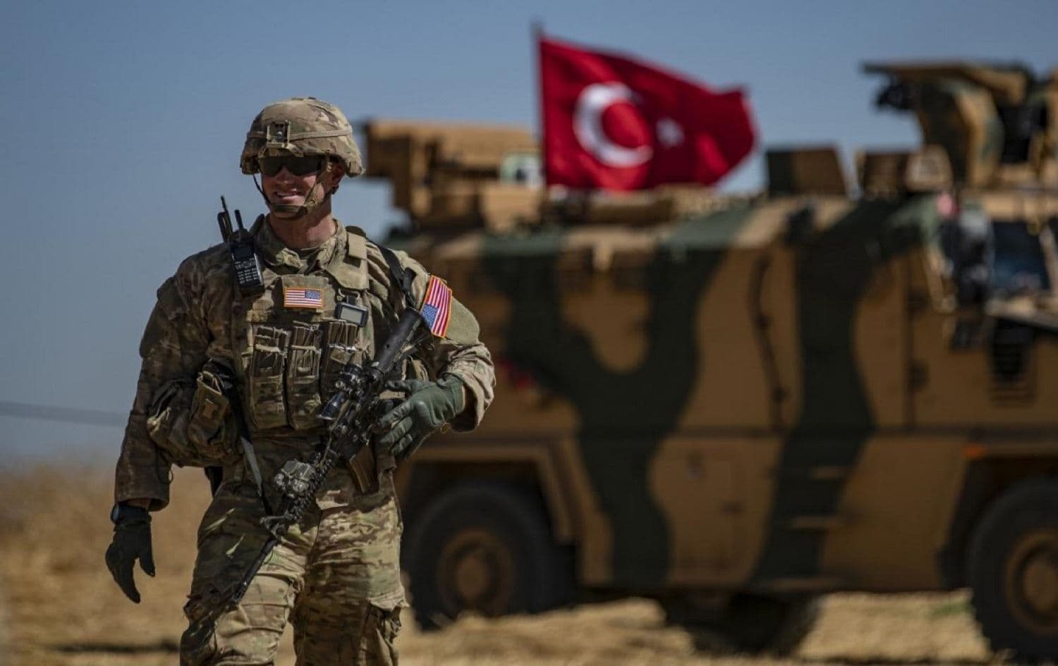 A US soldier stands guard during a joint patrol with Turkish troops near Gire Spi in September 2019. File photo: AFP