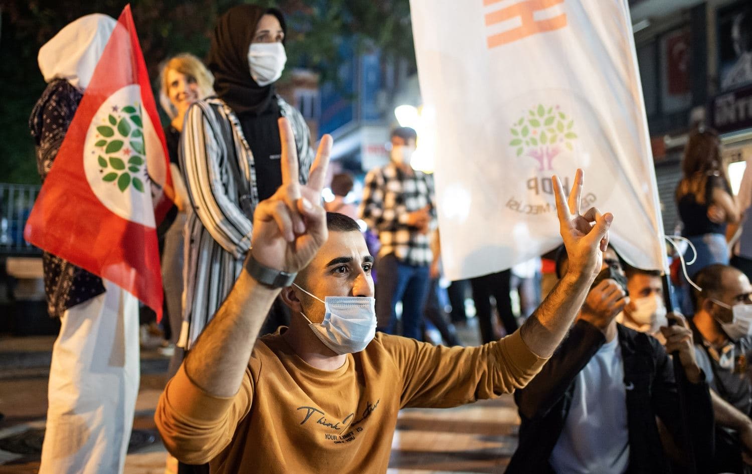 A man flashes a V sign as members of the pro-Kurdish Peoples Democratic Party (HDP) take part in a protest against the detention of HDP members, in Istanbul, on September 25, 2020. Photo: Yasin Akgul/AFP