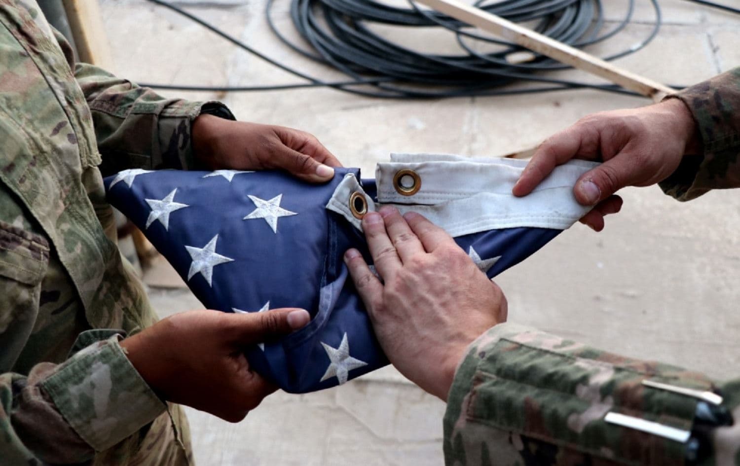 US forces take down the American flag at Iraq's Taji Military Complex on August 22, 2020. Photo: handout/Capt. Aaron Moshier/New Jersey National Guard