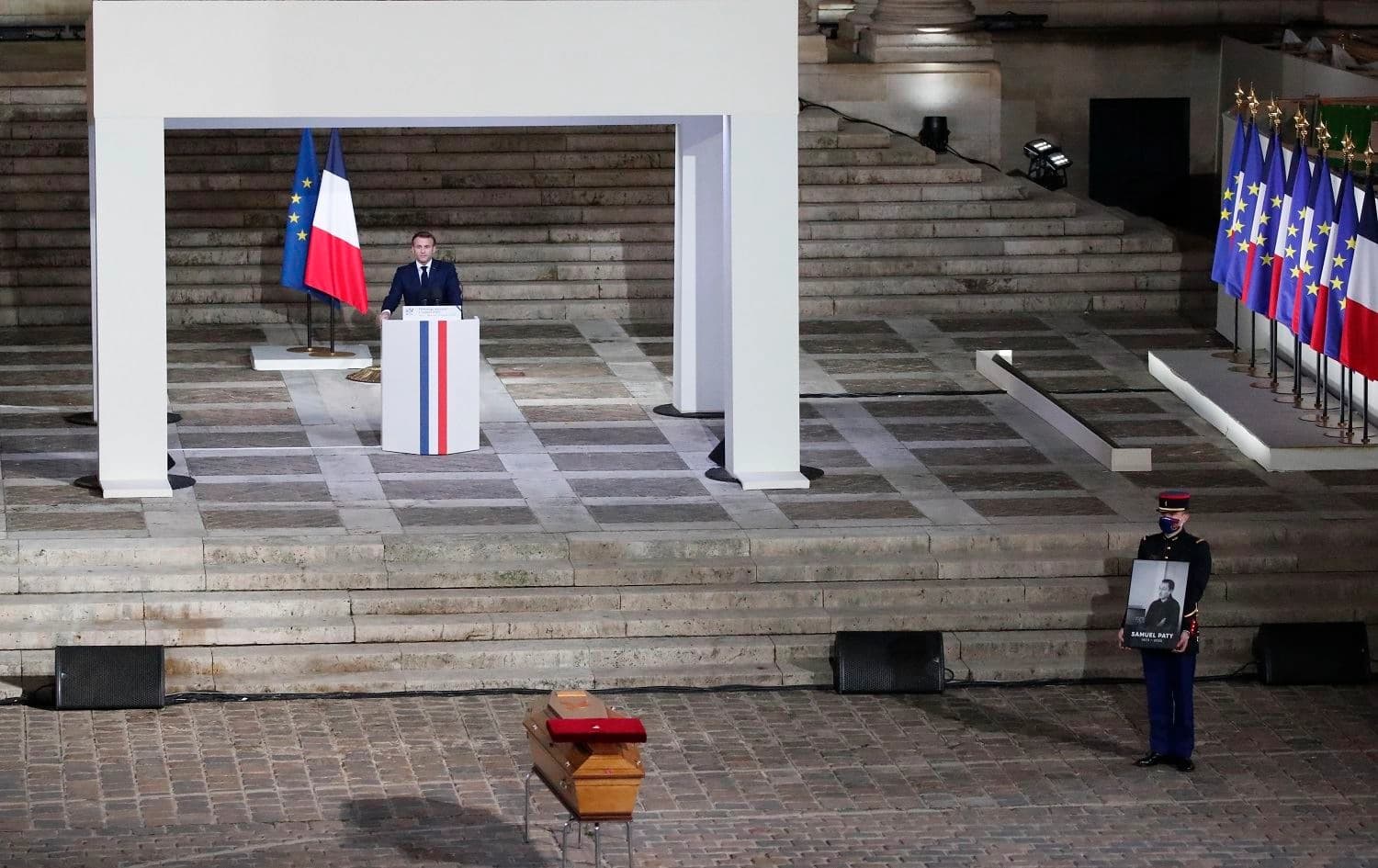 French President Emmanuel Macron delivers a speech in front of Samuel Paty's coffin in Paris on October 21, 2020. Photo: AFP