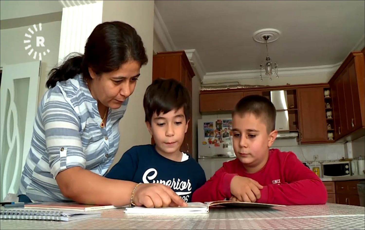 Mother in Turkey teaches Kurdish language at home amid lack of formal lessons
