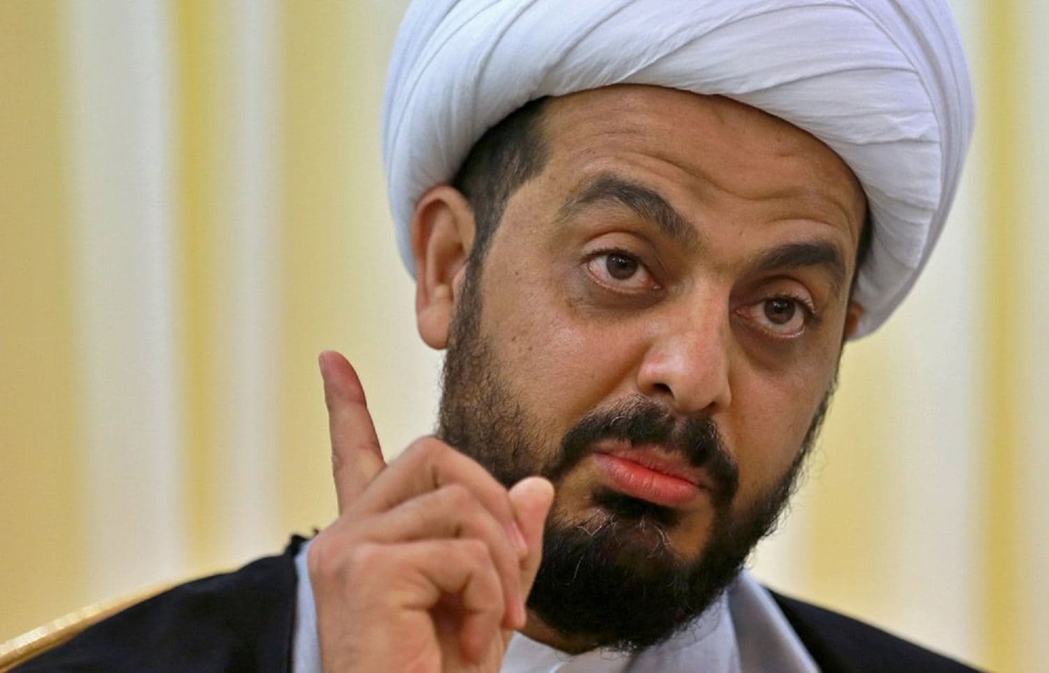 Qais al-Khazali, the leader of the militant Shiite group Asaib Ahl al-Haq, or League of the Righteous, speaks during an interview with AP in Baghdad, Iraq, Monday, Jan. 28, 2019. Photo: Khalid Mohammed / AP