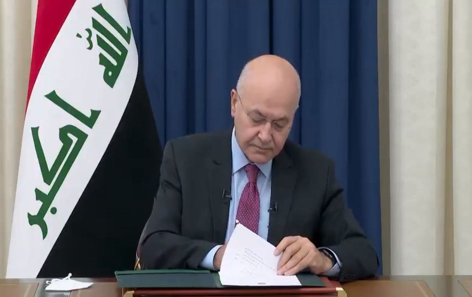 Iraqi President Barham Salih signing electoral reforms into law on November 5, 2020. Photo: screenshot