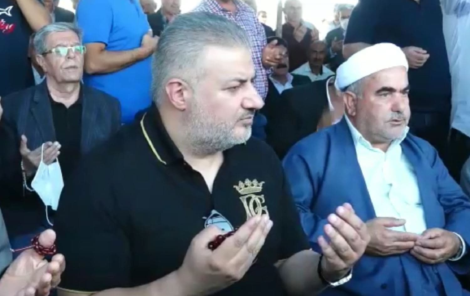 Naji Sharifi Zindashti attends the funeral he organised for his mother in September 2020. Photo: screenshot taken from video posted to a local Telegram channel