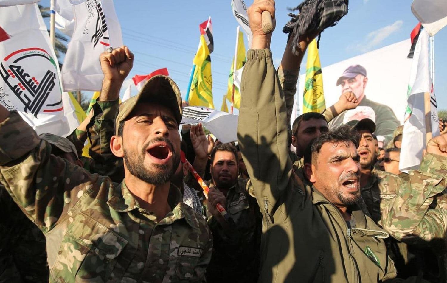 Members of the Popular Mobilization Forces (PMF) protest the killing of Qasem Soleimani and PMF deputy leader Abu Mahdi Al Muhandis in Baghdad on January 6, 2020. Photo: AFP
