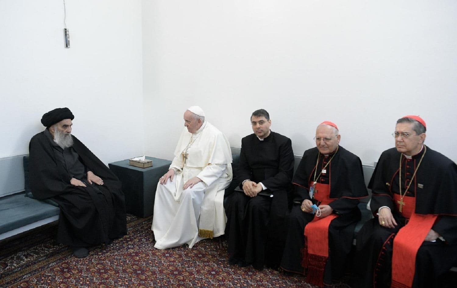Grand Ayatollah Ali al-Sistani (left) met with Pope Francis (second left) and church representatives including Cardinal Louis Raphael I Sako (second right) in Najaf on March 6, 2021. Photo: handout/Vatican News