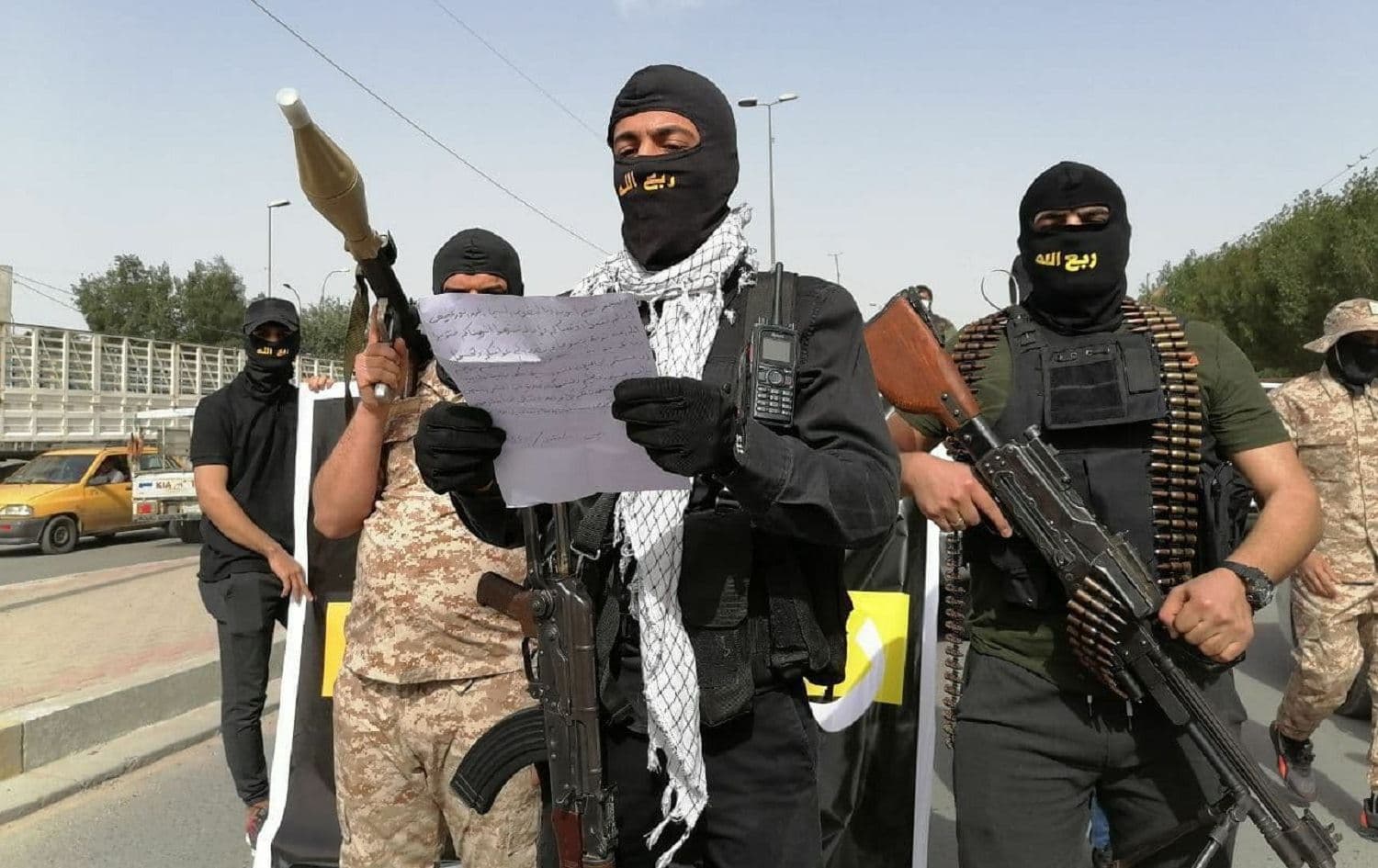 A member of the Iraqi Shiite militia Rab’Allah reads a statement on the streets of Baghdad on March 25, 2021. Photo: PMF-linked Telegram channels