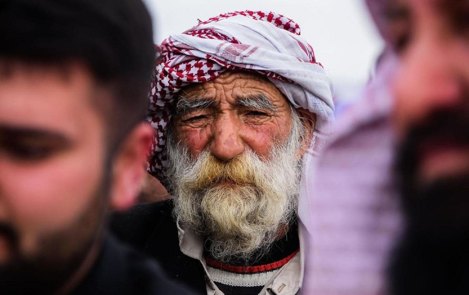 A Yazidi man during a funeral for villagers killed by ISIS in Kocho, Iraq on March 6, 2021. Photo: AFP 