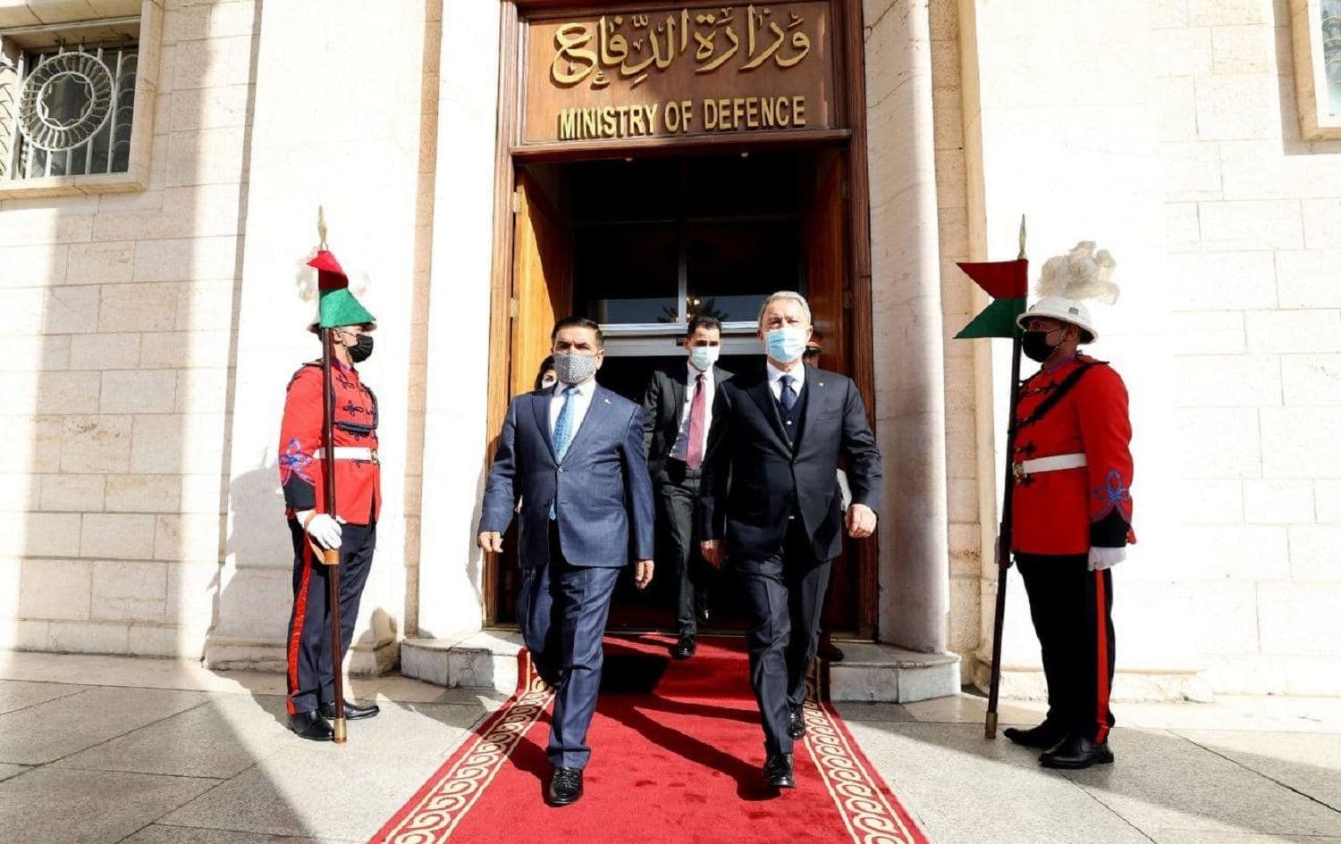 Turkish and Iraqi foreign ministers walk out of the Iraqi defense ministry headquarters in Baghdad on January 18, 2021. File photo: Turkish defense ministry