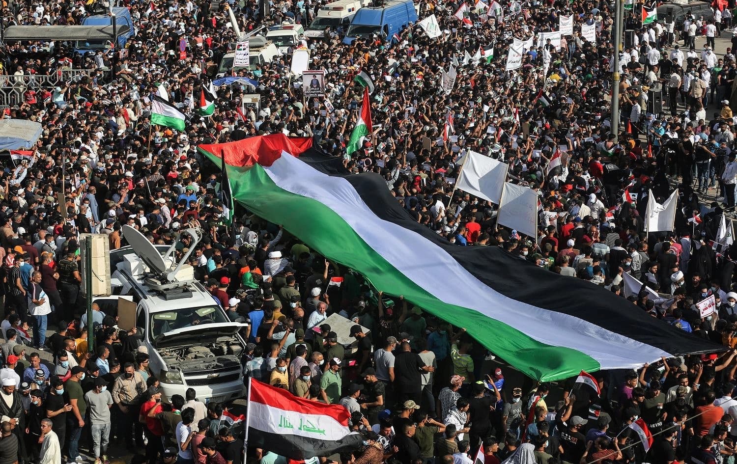  Iraqis gather in Baghdad's Tahrir square for a solidarity march with the Palestinians, on May 15, 2021. Photo: Ahmad al-Rubaye/AFP