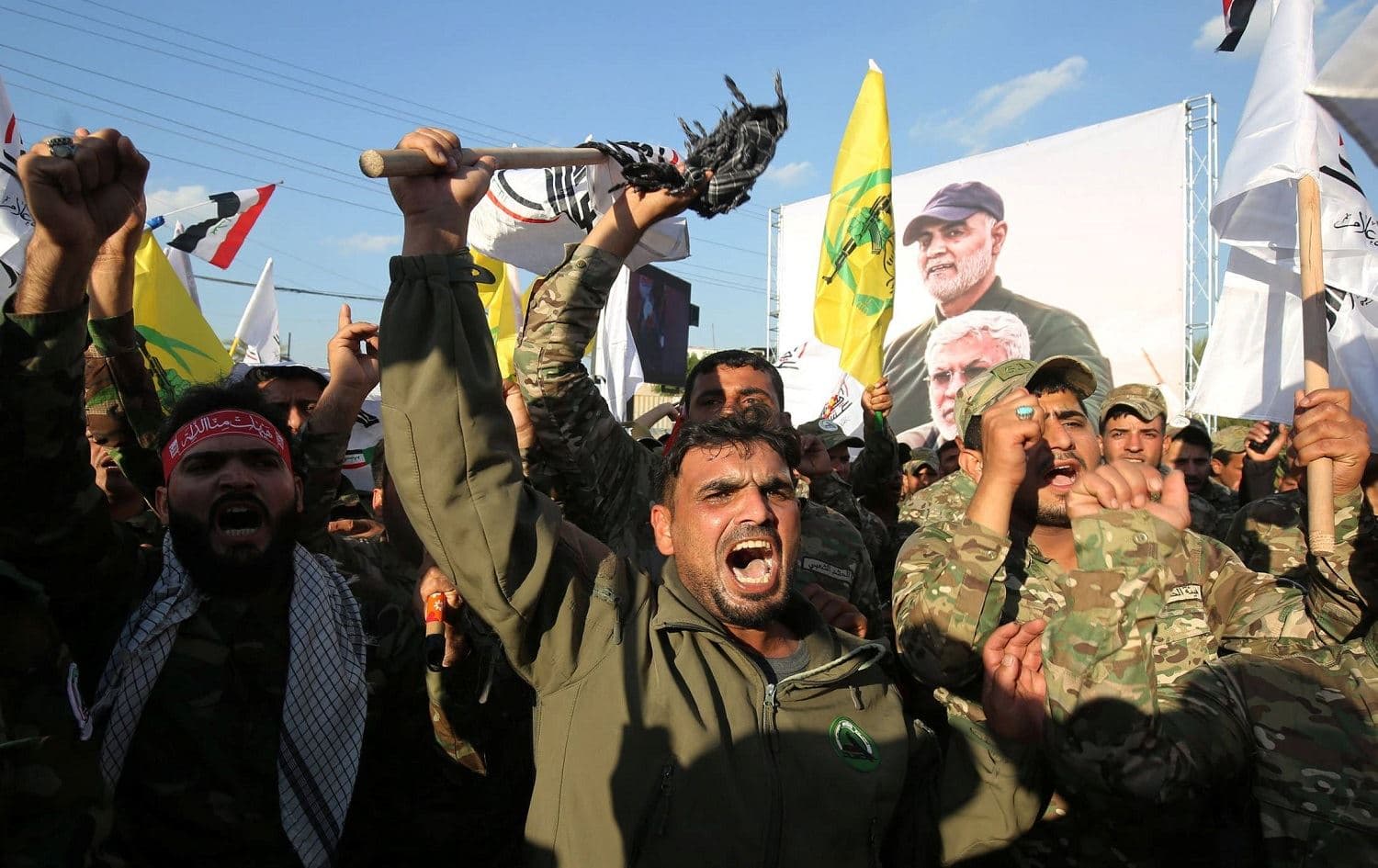 PMF members in Baghdad protest the killing of Qasem Soleimani and PMF Deputy Abu Mahdi al-Muhandis in January 2020. File photo: AFP