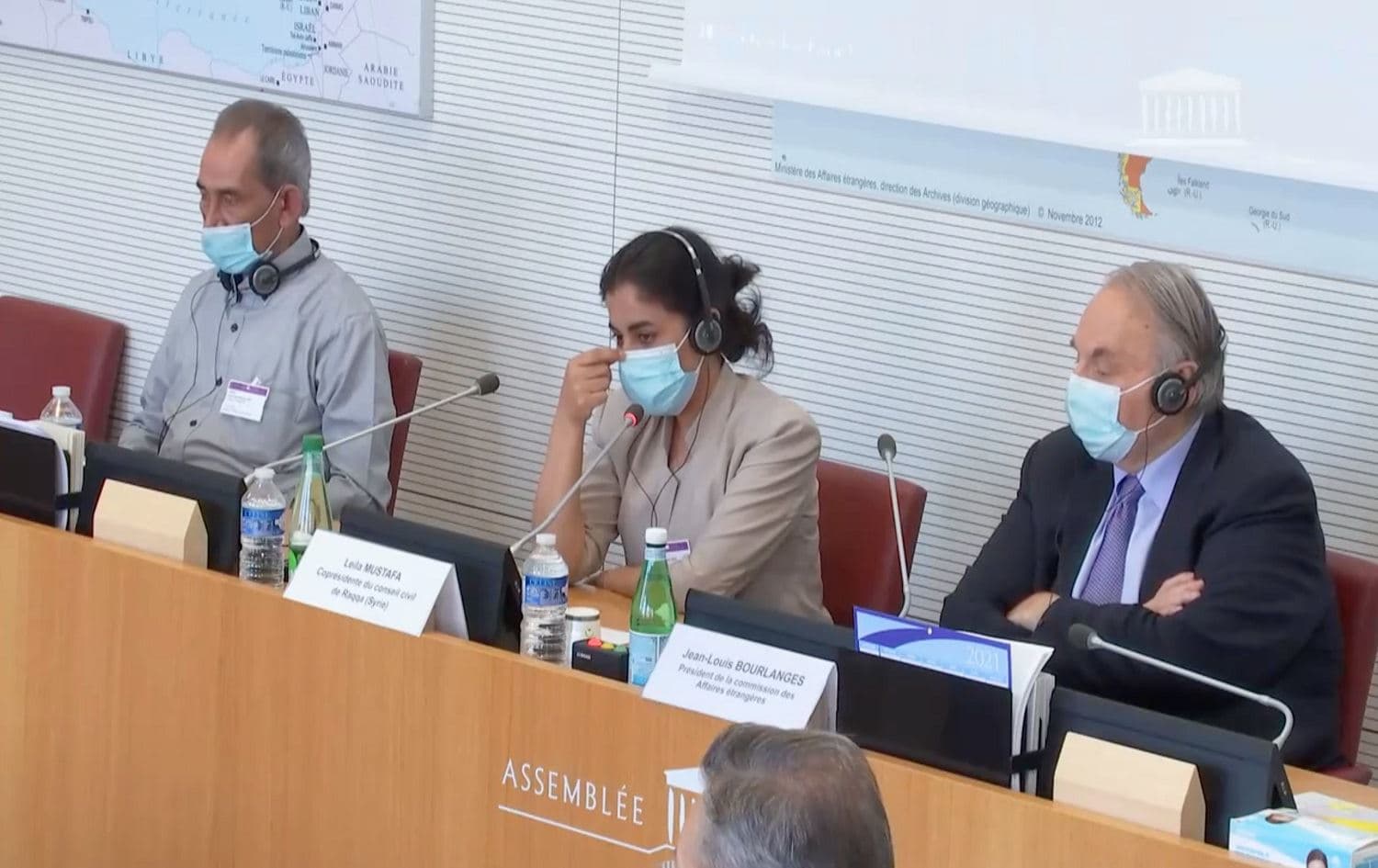 Rojava officials with French MPs in Paris on June 9, 2021. Photo: screenshot
