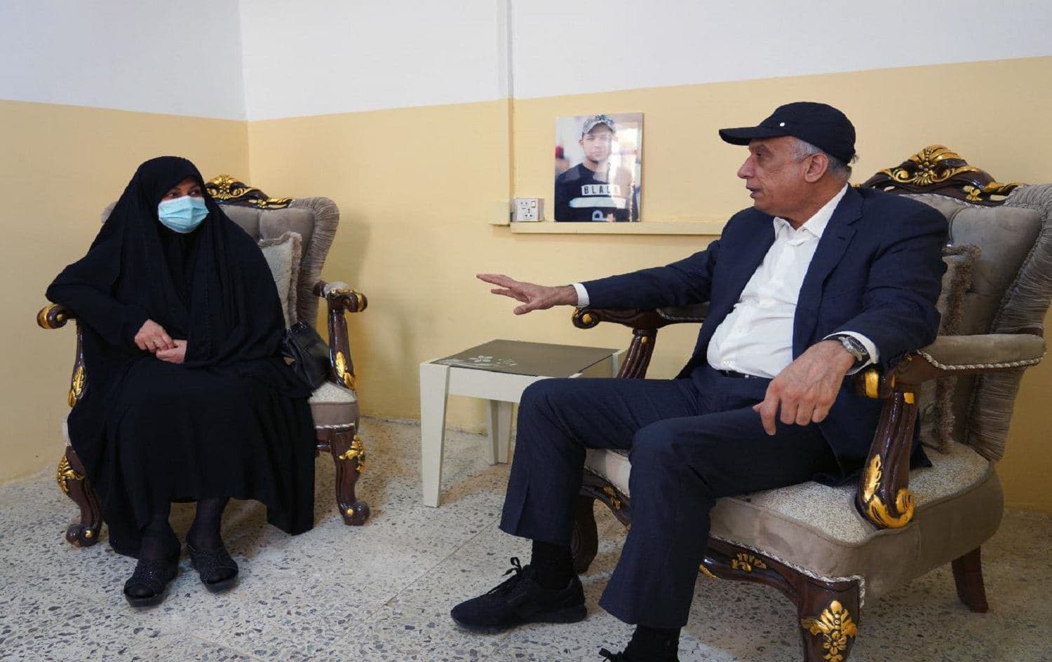 Slain activist Omar Sadoon's mother with Iraqi PM Kadhimi on June 12, 2021. Photo: PM office, official Facebook